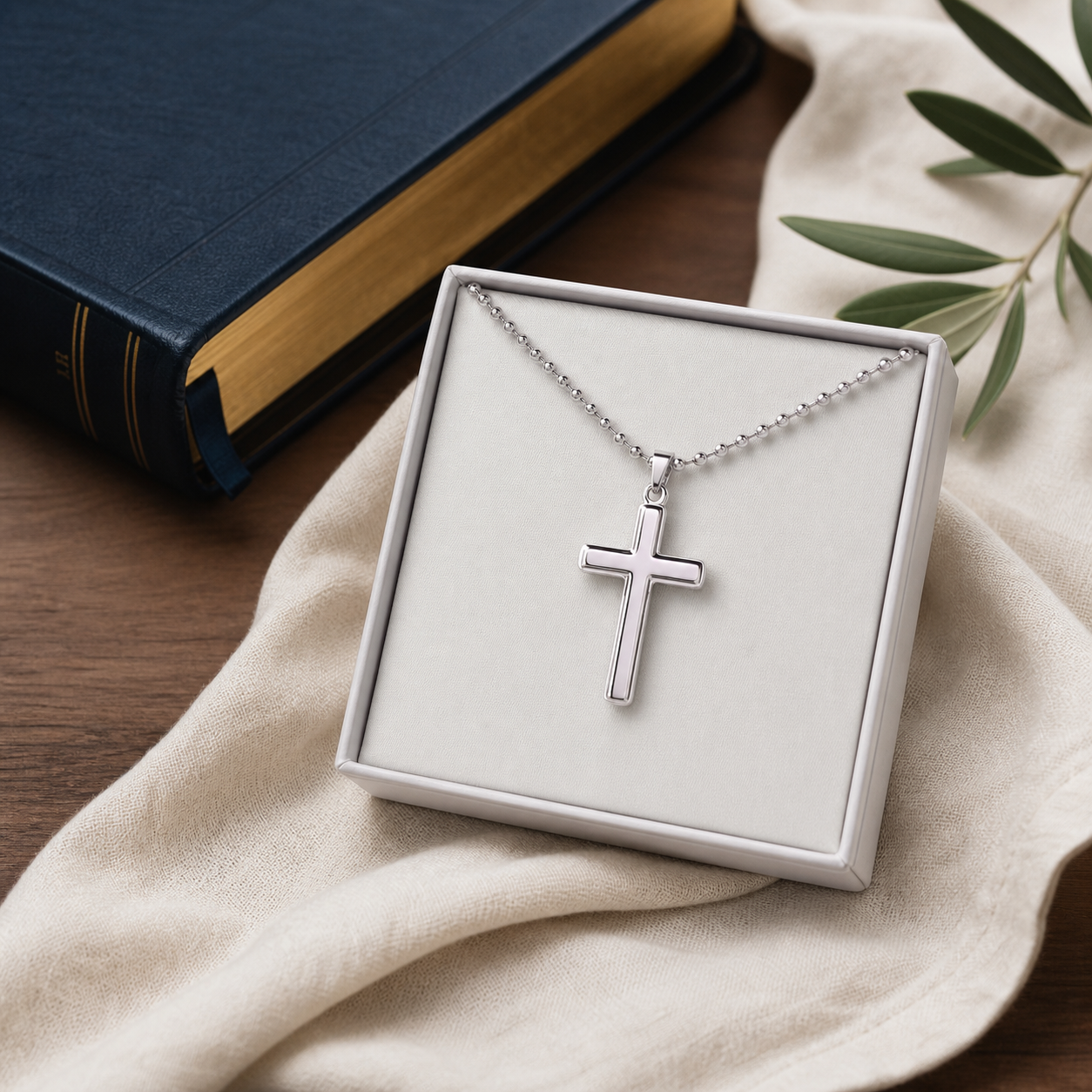 LWC Cross Necklace gift presentation shown beside a premium Bible and linen.