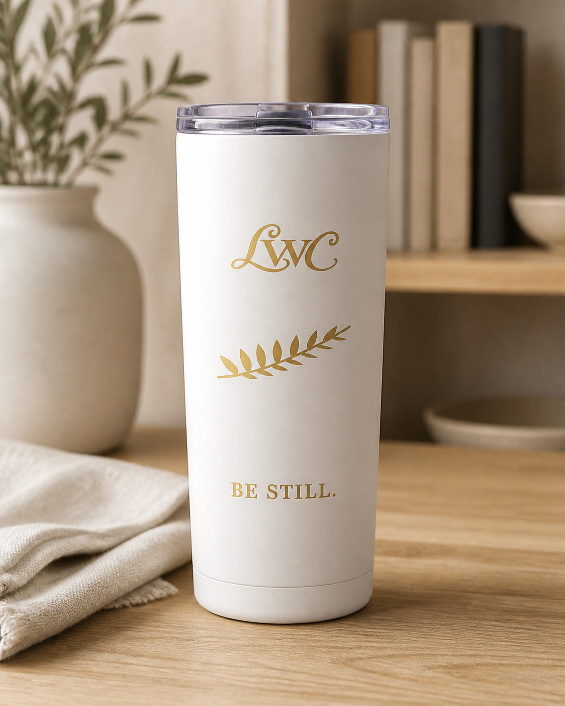 LWC Be Still tumbler in a boutique lifestyle setting